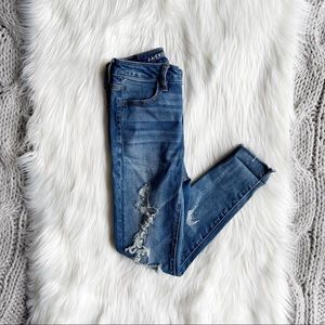 Medium wash distressed high waisted jeans